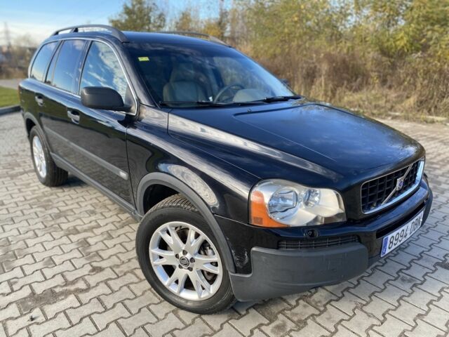 Черный Вольво ХС90, объемом двигателя 2.4 л и пробегом 322 тыс. км за 5550 $, фото 1 на Automoto.ua