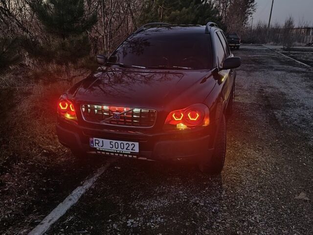 Черный Вольво ХС90, объемом двигателя 2.4 л и пробегом 352 тыс. км за 6500 $, фото 1 на Automoto.ua
