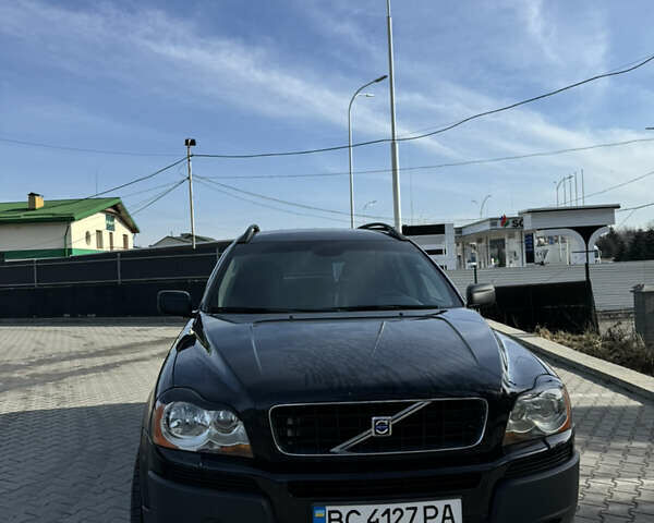 Черный Вольво ХС90, объемом двигателя 2.4 л и пробегом 285 тыс. км за 9900 $, фото 1 на Automoto.ua