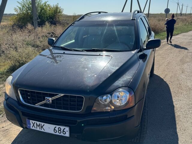 Черный Вольво ХС90, объемом двигателя 2.5 л и пробегом 300 тыс. км за 5500 $, фото 1 на Automoto.ua