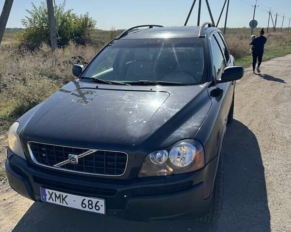 Черный Вольво ХС90, объемом двигателя 2.4 л и пробегом 300 тыс. км за 6000 $, фото 1 на Automoto.ua