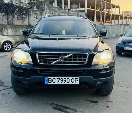 Черный Вольво ХС90, объемом двигателя 2.4 л и пробегом 215 тыс. км за 12000 $, фото 1 на Automoto.ua