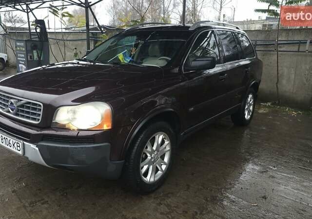 Красный Вольво ХС90, объемом двигателя 2.4 л и пробегом 399 тыс. км за 8500 $, фото 1 на Automoto.ua