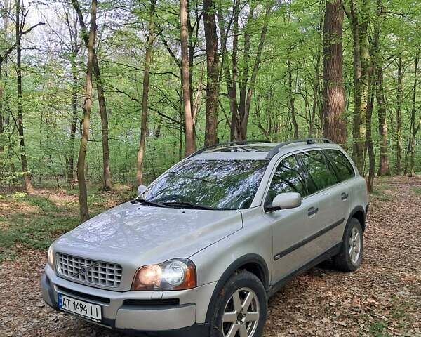 Серый Вольво ХС90, объемом двигателя 2.4 л и пробегом 320 тыс. км за 9400 $, фото 1 на Automoto.ua