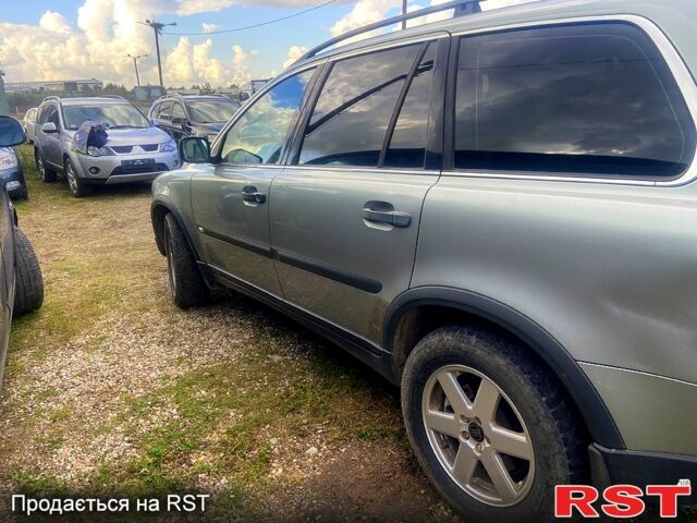 Серый Вольво ХС90, объемом двигателя 2.4 л и пробегом 390 тыс. км за 4500 $, фото 1 на Automoto.ua