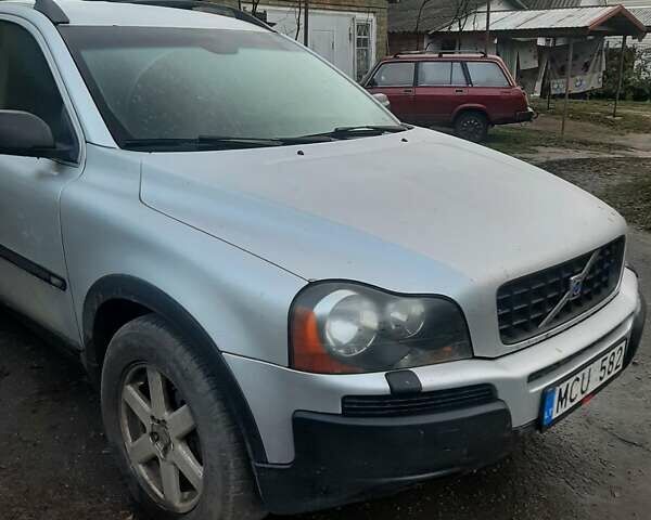 Серый Вольво ХС90, объемом двигателя 2.4 л и пробегом 325 тыс. км за 4700 $, фото 1 на Automoto.ua