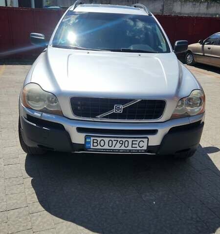 Серый Вольво ХС90, объемом двигателя 2.4 л и пробегом 400 тыс. км за 11000 $, фото 1 на Automoto.ua