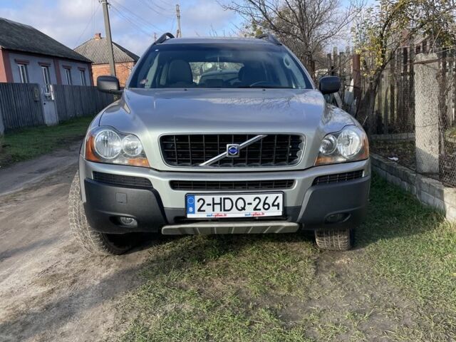 Серый Вольво ХС90, объемом двигателя 2.4 л и пробегом 241 тыс. км за 6100 $, фото 1 на Automoto.ua
