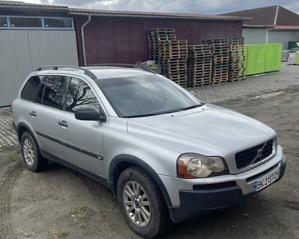 Серый Вольво ХС90, объемом двигателя 2.4 л и пробегом 290 тыс. км за 10500 $, фото 1 на Automoto.ua
