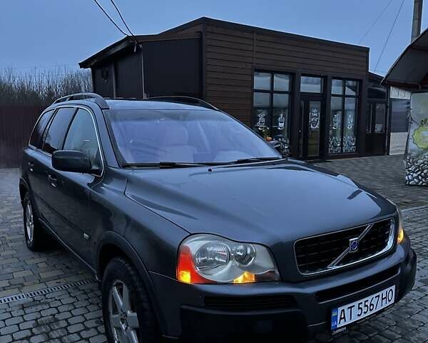 Серый Вольво ХС90, объемом двигателя 2.4 л и пробегом 402 тыс. км за 7500 $, фото 1 на Automoto.ua