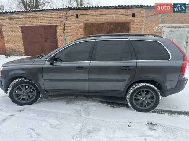 Серый Вольво ХС90, объемом двигателя 2.4 л и пробегом 330 тыс. км за 11500 $, фото 1 на Automoto.ua