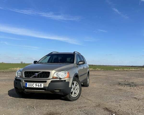 Серый Вольво ХС90, объемом двигателя 2.4 л и пробегом 433 тыс. км за 6700 $, фото 1 на Automoto.ua