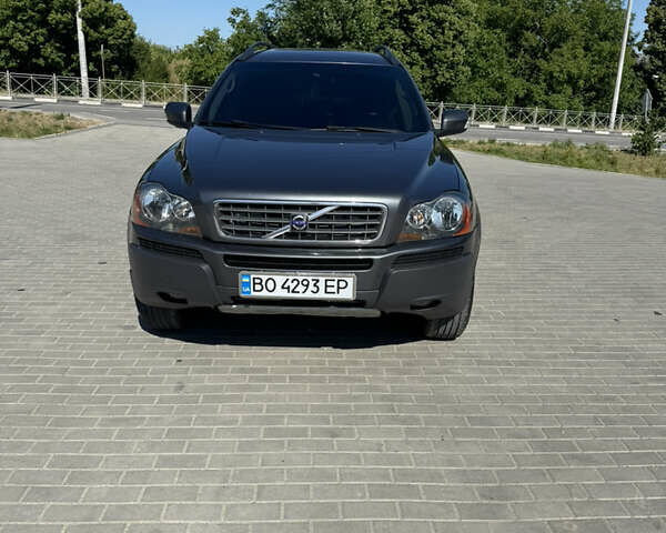 Серый Вольво ХС90, объемом двигателя 2.4 л и пробегом 320 тыс. км за 13800 $, фото 1 на Automoto.ua