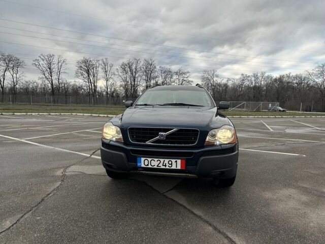 Синий Вольво ХС90, объемом двигателя 2.4 л и пробегом 270 тыс. км за 5300 $, фото 1 на Automoto.ua