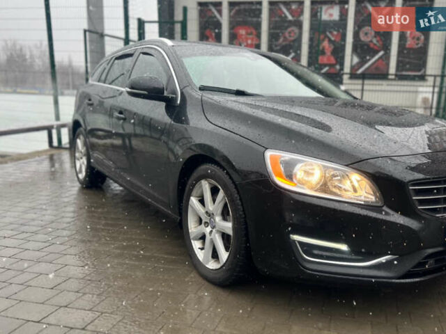 Черный Вольво V60 Cross Country, объемом двигателя 2 л и пробегом 82 тыс. км за 14900 $, фото 1 на Automoto.ua