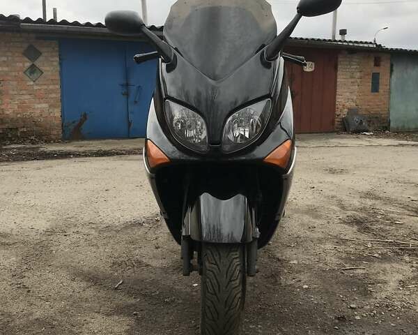 Черный Ямаха T-Max 500, объемом двигателя 0.5 л и пробегом 50 тыс. км за 2500 $, фото 1 на Automoto.ua