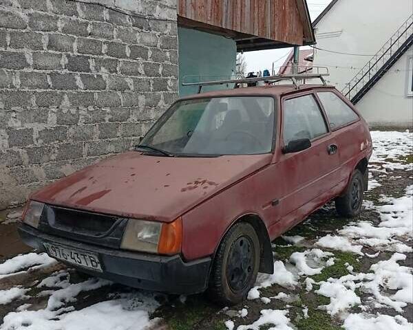 Красный ЗАЗ 1102 Таврия, объемом двигателя 1.1 л и пробегом 300 тыс. км за 200 $, фото 1 на Automoto.ua