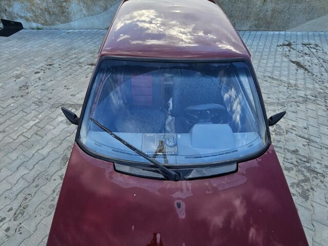 Красный ЗАЗ 1102 Таврия, объемом двигателя 1 л и пробегом 200 тыс. км за 476 $, фото 1 на Automoto.ua