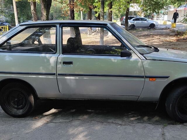 Сірий ЗАЗ 1102 Таврія, об'ємом двигуна 1.2 л та пробігом 100 тис. км за 947 $, фото 1 на Automoto.ua
