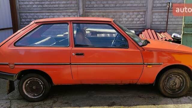 Оранжевый ЗАЗ 1102 Таврия, объемом двигателя 1.1 л и пробегом 147 тыс. км за 750 $, фото 1 на Automoto.ua