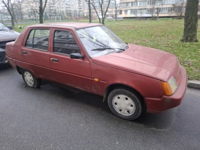 Красный ЗАЗ 1103 Славута, объемом двигателя 1 л и пробегом 250 тыс. км за 593 $, фото 1 на Automoto.ua