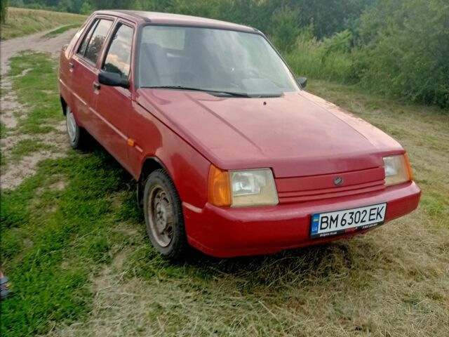 Красный ЗАЗ 1103 Славута, объемом двигателя 1.2 л и пробегом 86 тыс. км за 1100 $, фото 1 на Automoto.ua