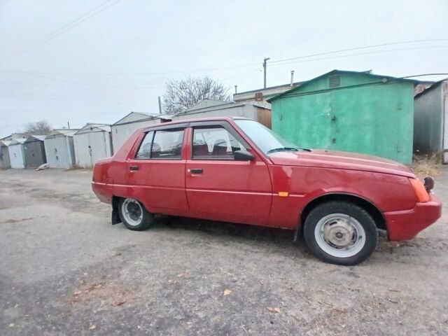 Красный ЗАЗ 1103 Славута, объемом двигателя 1.2 л и пробегом 65 тыс. км за 1800 $, фото 1 на Automoto.ua