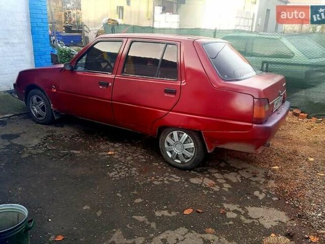 Красный ЗАЗ 1103 Славута, объемом двигателя 1.1 л и пробегом 238 тыс. км за 400 $, фото 1 на Automoto.ua