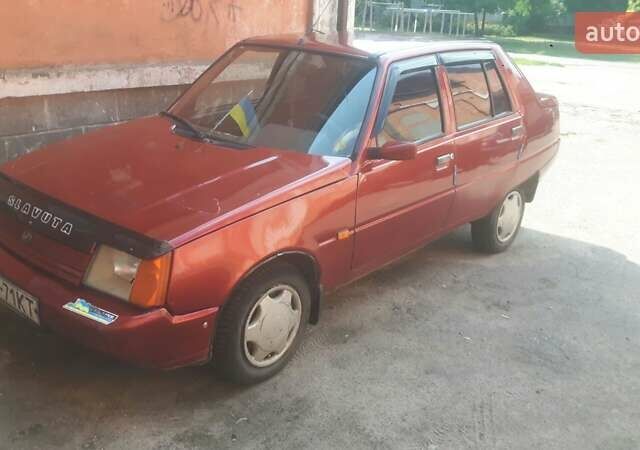 Красный ЗАЗ 1103 Славута, объемом двигателя 1.2 л и пробегом 145 тыс. км за 1400 $, фото 1 на Automoto.ua