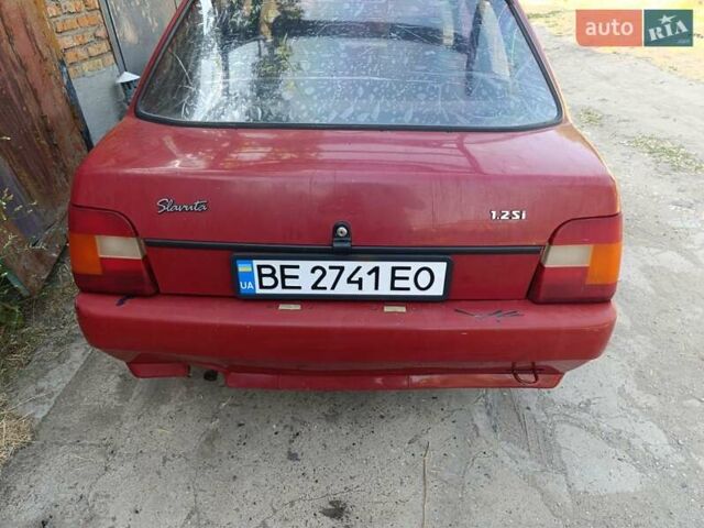 Красный ЗАЗ 1103 Славута, объемом двигателя 1.2 л и пробегом 65 тыс. км за 1400 $, фото 1 на Automoto.ua