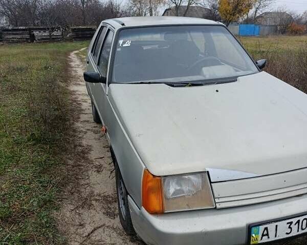 Серый ЗАЗ 1103 Славута, объемом двигателя 1.2 л и пробегом 200 тыс. км за 1000 $, фото 1 на Automoto.ua