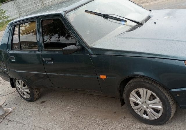 Зеленый ЗАЗ 1103 Славута, объемом двигателя 1.2 л и пробегом 200 тыс. км за 426 $, фото 1 на Automoto.ua