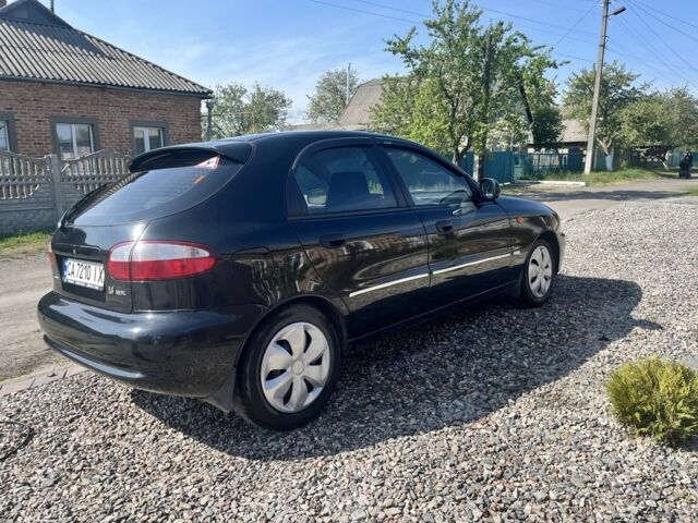 Чорний ЗАЗ Ланос, об'ємом двигуна 1.4 л та пробігом 112 тис. км за 3300 $, фото 1 на Automoto.ua