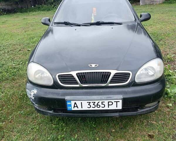 Чорний ЗАЗ Ланос, об'ємом двигуна 1.39 л та пробігом 315 тис. км за 2300 $, фото 1 на Automoto.ua