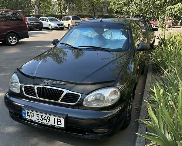 Черный ЗАЗ Ланос, объемом двигателя 1.39 л и пробегом 245 тыс. км за 2600 $, фото 1 на Automoto.ua