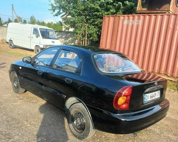 Чорний ЗАЗ Ланос, об'ємом двигуна 1.3 л та пробігом 66 тис. км за 2000 $, фото 1 на Automoto.ua