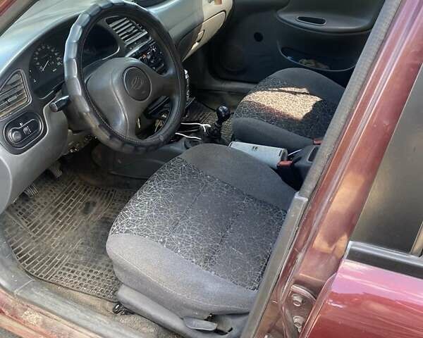 Червоний ЗАЗ Ланос, об'ємом двигуна 1.5 л та пробігом 206 тис. км за 2250 $, фото 1 на Automoto.ua