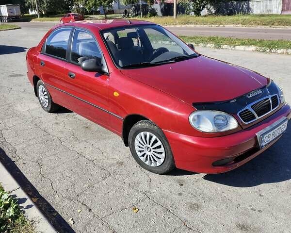 Красный ЗАЗ Ланос, объемом двигателя 1.4 л и пробегом 110 тыс. км за 2399 $, фото 1 на Automoto.ua