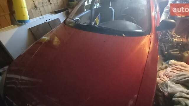 Красный ЗАЗ Ланос, объемом двигателя 1.39 л и пробегом 91 тыс. км за 3200 $, фото 1 на Automoto.ua