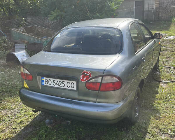 Сірий ЗАЗ Ланос, об'ємом двигуна 1.39 л та пробігом 295 тис. км за 2000 $, фото 1 на Automoto.ua