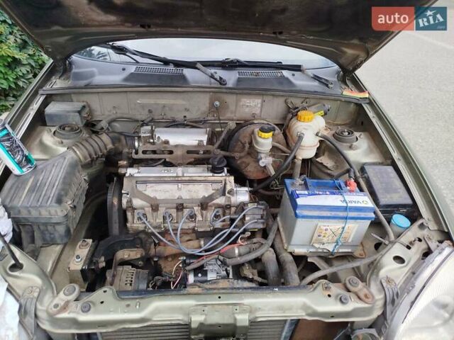 Зеленый ЗАЗ Ланос, объемом двигателя 1.39 л и пробегом 242 тыс. км за 1100 $, фото 1 на Automoto.ua