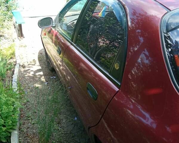 Червоний ЗАЗ Sens, об'ємом двигуна 1.3 л та пробігом 224 тис. км за 1800 $, фото 1 на Automoto.ua