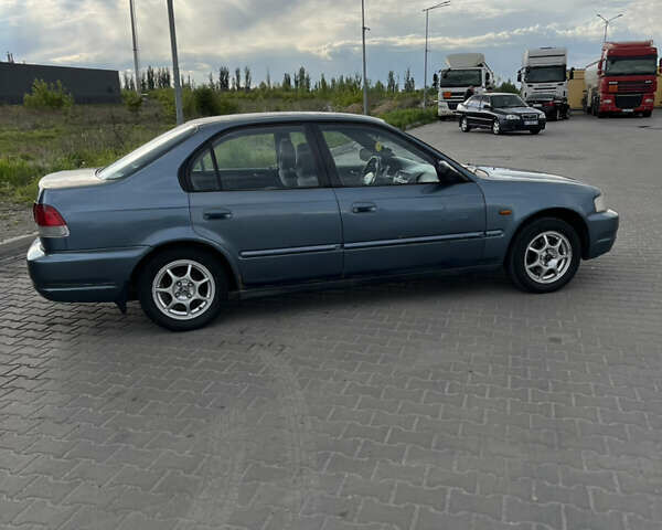 Синий Акура ЕЛ, объемом двигателя 1.6 л и пробегом 330 тыс. км за 4400 $, фото 2 на Automoto.ua