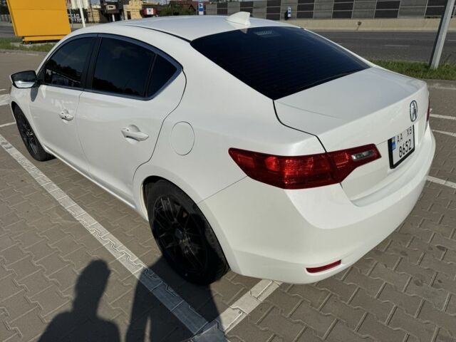 Білий Акура ІЛХ, об'ємом двигуна 2 л та пробігом 130 тис. км за 10000 $, фото 5 на Automoto.ua