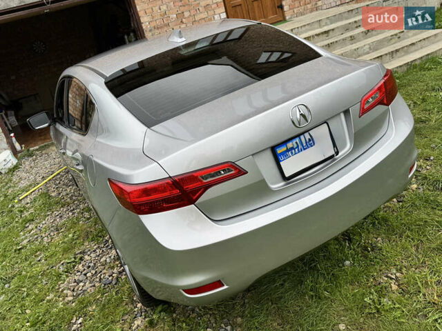 Сірий Акура ІЛХ, об'ємом двигуна 2 л та пробігом 125 тис. км за 9950 $, фото 4 на Automoto.ua