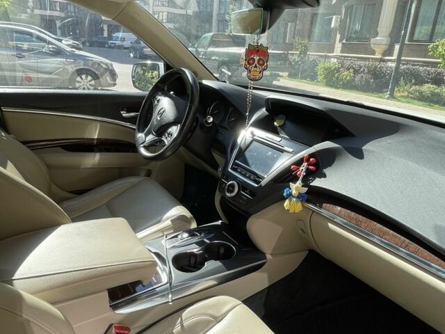 Белый Акура МДХ, объемом двигателя 3.5 л и пробегом 109 тыс. км за 26800 $, фото 2 на Automoto.ua