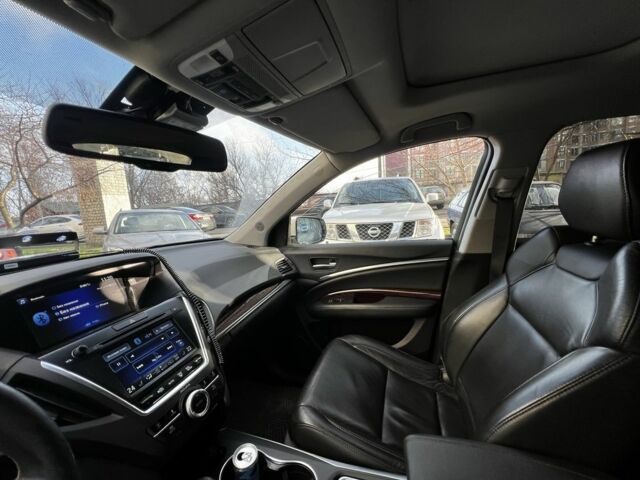 Белый Акура МДХ, объемом двигателя 3.5 л и пробегом 245 тыс. км за 17500 $, фото 1 на Automoto.ua