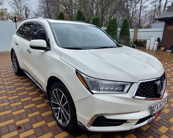 Белый Акура МДХ, объемом двигателя 3.47 л и пробегом 130 тыс. км за 20900 $, фото 3 на Automoto.ua