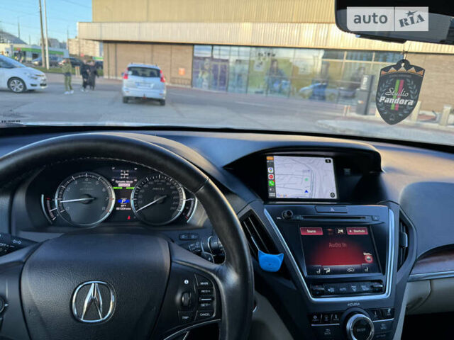 Белый Акура МДХ, объемом двигателя 3.47 л и пробегом 82 тыс. км за 25000 $, фото 10 на Automoto.ua