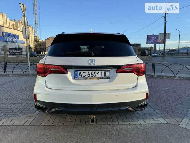 Белый Акура МДХ, объемом двигателя 3.47 л и пробегом 82 тыс. км за 25000 $, фото 2 на Automoto.ua